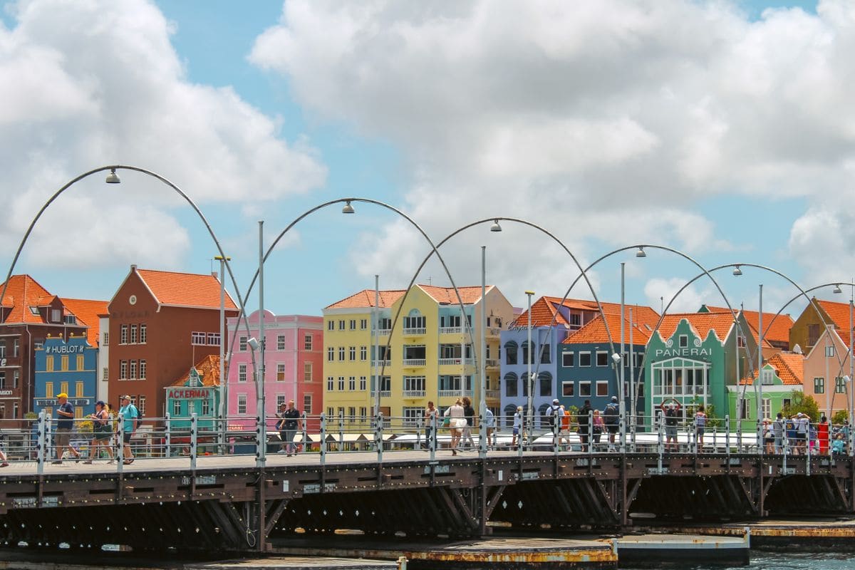 The Queen Emma Bridge and the colourful waterfront houses of Willemstad, Curaçao